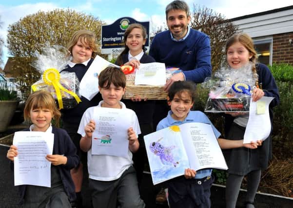 Owner of the  Arun Veterinary Group Matt Gittings is opening a new animal hospital in Storrington and ran a competition with the local school inviting children at Storrington Primary School, to write a poem about animals. Pic Steve Robards SR1805124 SUS-180220-174840001