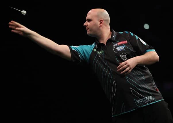 Rob Cross at the oche during his victory over Raymond van Barneveld in Berlin. Picture courtesy Lawrence Lustig/PDC