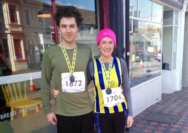 Claire O'Neill and William Peters fter completing the Tunbridge Wells Half Marathon SUS-180227-131628001