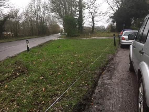No parking signs and cordoned off land at Adsdean, Funtington