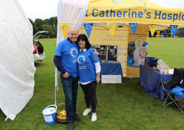 St Catherine's Hospice fundraisers Tricia and Mark Lay from Crawley - submitted by St Catherine's Hospice SUS-161011-155633001