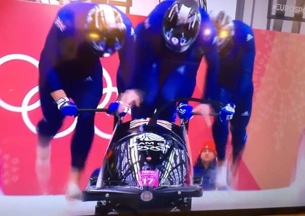 Sussex's Brad Hall in action for Team GB  in the Four-Man Bobsleigh Heat 1at the Winter Olympics in South Korea. Picture by Graham Carter SUS-180224-024854002