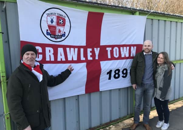 Reds fans Steve Giles from Cornwall with son Ashley Giles and his fiancÃ©e Carly Stevenson at Forest Green Rovers last Saturday. Picture by Steve Herbert SUS-180225-103304002