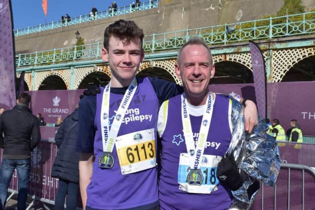 Proud dad Norman Cook with his son Woody after the half marathon