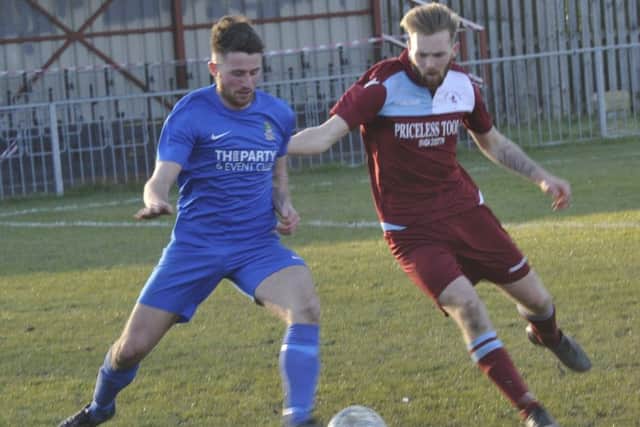 Ryan Paul closes down a Selsey opponent.
