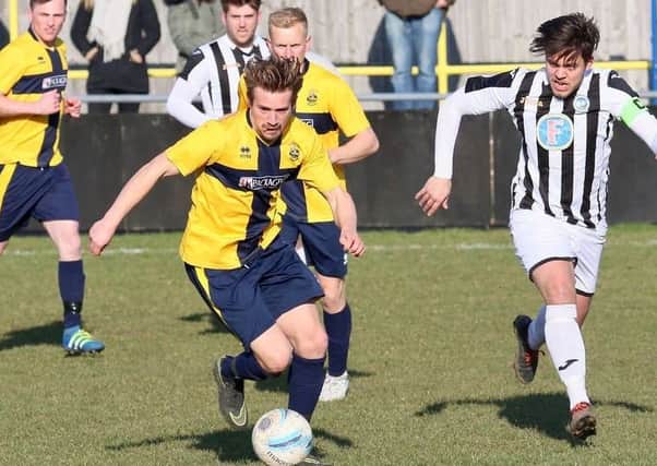 Eastbourne Town in action against Peacehaven