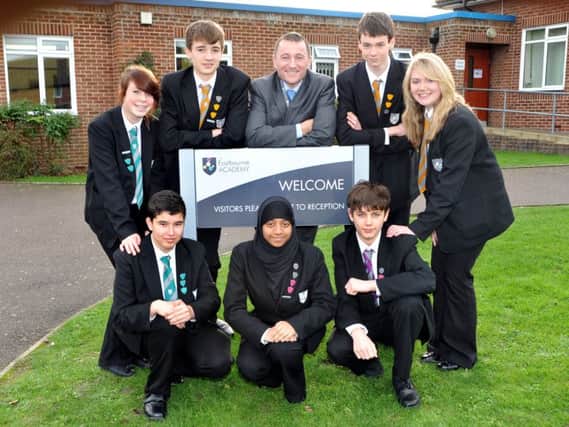 Keith Pailthorpe, and former pupils, celebrating his first Good OFSTED report at the Academy