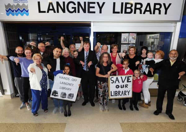 Councillor Alan Shuttleworth with residents campaigning against the closure of Langney Library in Eastbourne (Photo by Jon Rigby) SUS-170914-103233008