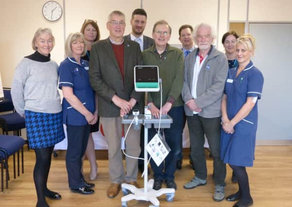 Urology department staff at St Richard's alongside Love Your Hospital and PCaSO members with the new scanner