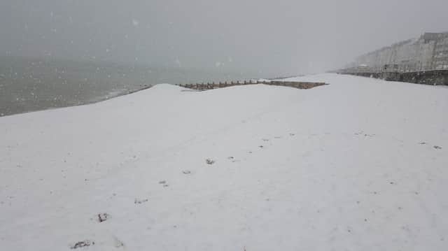St Leonards beach covered in snow. Picture by Niki VonEhren Worth SUS-180227-092848001