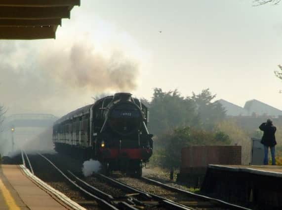 A more recent steam train visit, the Black Five locomotive steaming through Southwick Railway Station. Picture: Mike Jennings