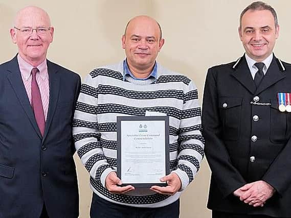 PCSO Amir Nasir (centre) volunteered his language skills to aid Operation Lexus, an investigation into the killing of a 37-year-old Latvian man in St Leonards.