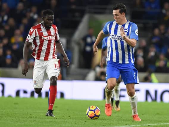 Lewis Dunk on the ball during Albion's televised 2-2 draw with Stoke in November. Picture by Phil Westlake (PW Sporting Photography)