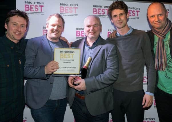 Little Fish Market named Number One restaurant: Patrick McGuigan (awards cofounder); chef Duncan Ray; Andy Lynes (awards co-founder); Rob Smith, general manager; Simon Rogan, who presented the award. (Photograph: Xavier D Buendia) SUS-180228-103946001