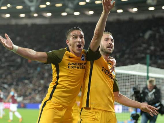 Glenn Murray (right) celebrates a goal with Anthony Knockaert. Picture by Phi Westlake (PW Sporting Photography)