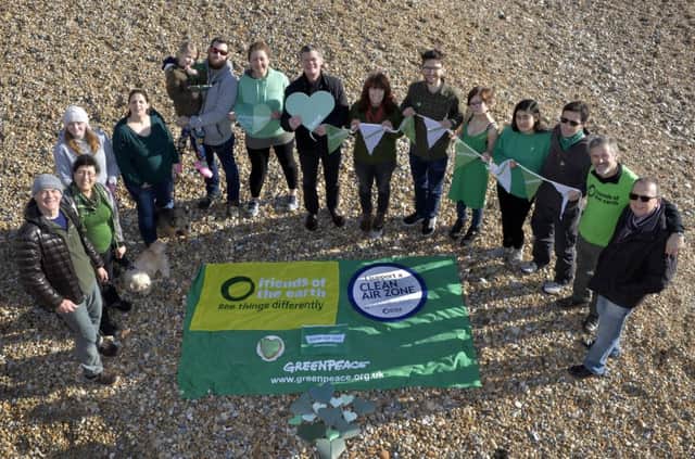 Greenpeace on Eastbourne beach to highlight the need for cleaning up our beaches for the good of our environment (Photo by Jon Rigby) SUS-180219-114837008