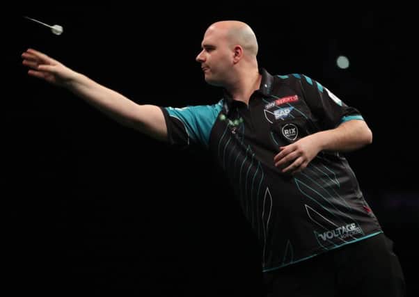 Rob Cross at the oche during his victory over Raymond van Barneveld in Berlin last Thursday. Picture courtesy Lawrence Lustig/PDC