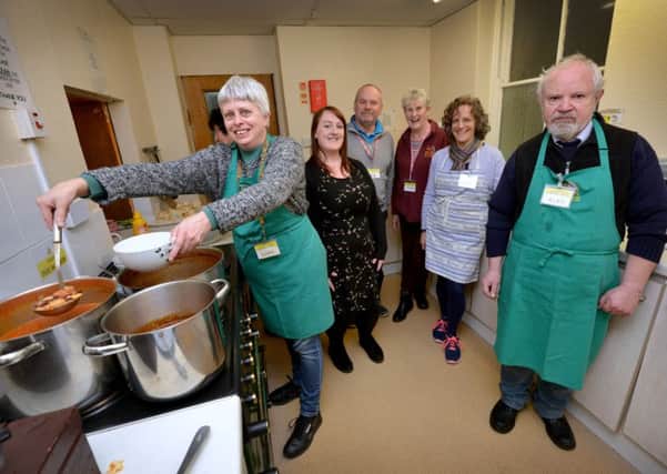 Observer chief reporter Maria Hudd with Hope Kitchen volunteers