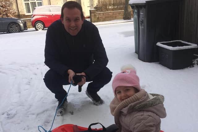 Ruby Caines, 5, from Hove, made her way to Benfield Primary School on Tuesday by sledge, with help from her dad Joel
