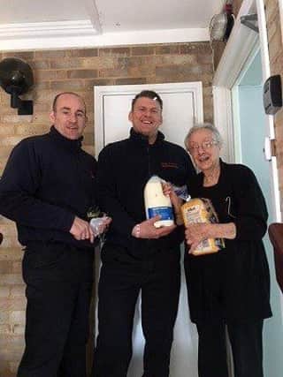 Firefighters in Lewes helping elderly residents SUS-180103-124140001