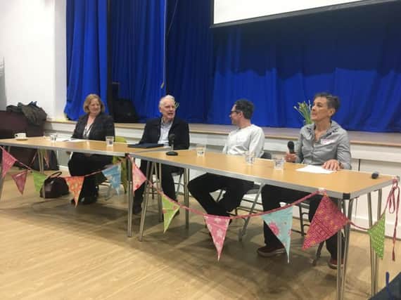 Speakers at the community housing event