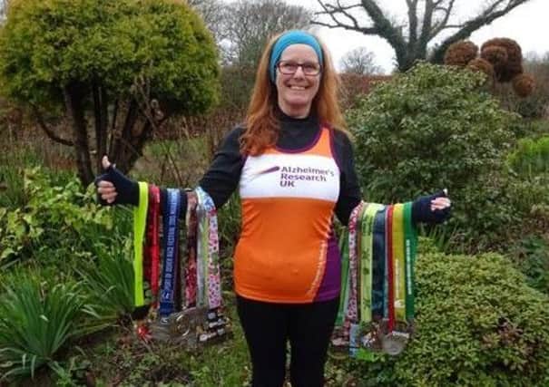 Susie Hewer and her 20 medals! SUS-180603-160353001