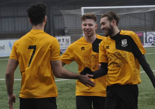 Jack McLean (left) is congratulated by Corey Wheeler (centre) and Nathan Lopez (right) after scoring the first of his three goals. Pictures by Simon Newstead