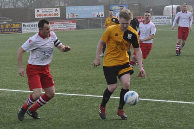 Bexhill United midfielder Liam Foster on the ball.