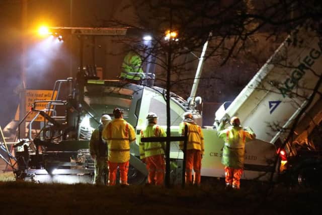 The Grove Lodge roundabout in Worthing was finally being repaired last night (March 3). Picture: Eddie Mitchell