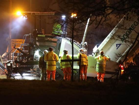 The Grove Lodge roundabout in Worthing was finally being repaired last night (March 3). Picture: Eddie Mitchell
