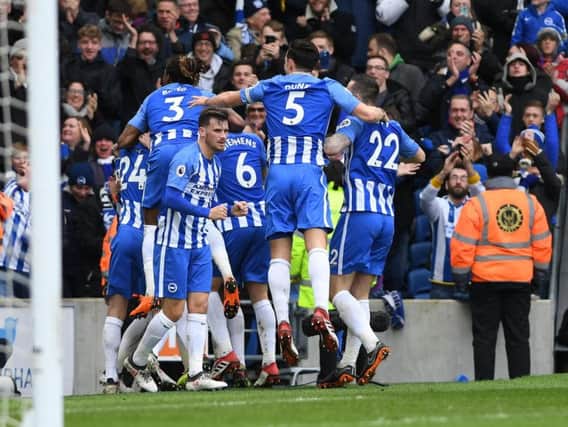 Albion players celebrate Glenn Murray's goal. Picture by Phil Westlake (PW Sporting Photography)