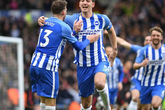 Captain Lewis Dunk and Pascal Gross celebrate going 1-0 up against Arsenal. Picture by PW Sporting Photography
