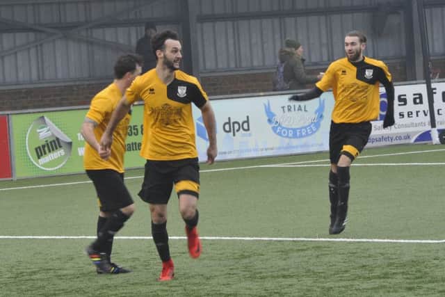 Jack McLean celebrates after scoring the first of his three goals.