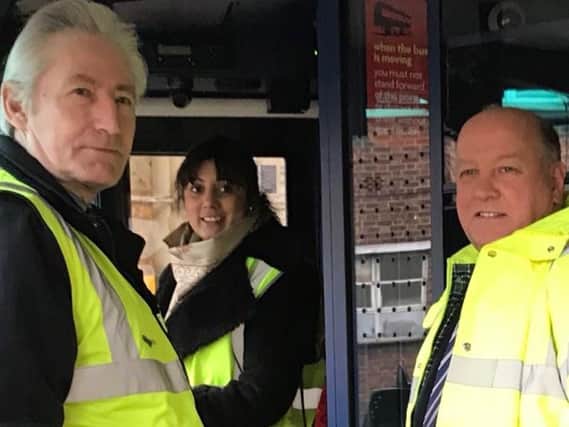 Transport Minister Nusrat Ghani (centre) with Brighton and Hove Buses director of operations Kevin Carey (left) and managing director Martin Harris (right)