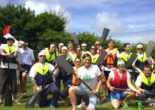 The CanerWise team taking part in the boat race