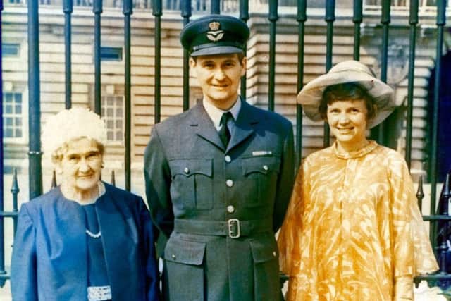 Peter receiving MBE at Buckingham Palace 1967, accompanied by wife and mother SUS-180603-105509001