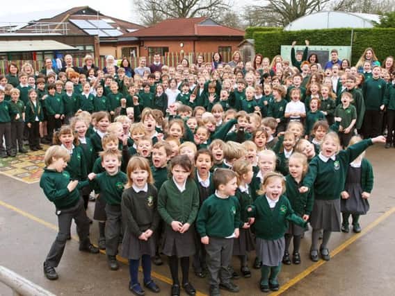 Staff and children at Wisborough Green Primary
