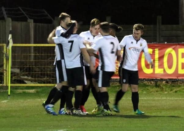 Pagham celebrate a goal in their quarter-final win over Horsham / Picture by Roger Smith