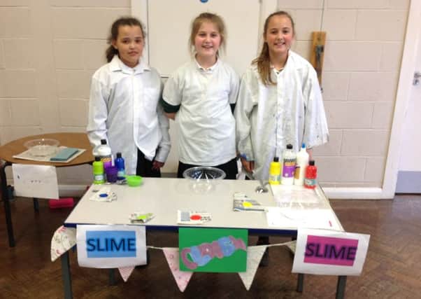 Pupils prepare an experiment ready to show younger students