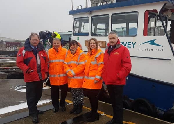 Tim at Shoreham Harbour with Ports Minister Nusrat Ghani, centre, Shoreham Port chief executive Rodney Lunn, second from left, and representatives from the British Ports Association