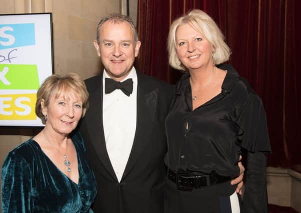 Friends of Sussex Hospices Kathy Gore with Hugh Bonneville and Lulu Williams. Pictures: Graham Franks Photography