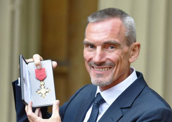 William Ward with his OBE following an investiture ceremony at Buckingham Palace. Photo: John Stillwell/PA Wire