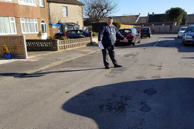 Liberal Democrat councillor Bob Smytherman in Ely Road. Picture by Martin McCabe