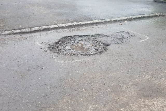 A pothole in Penn Crescent Haywards Heath