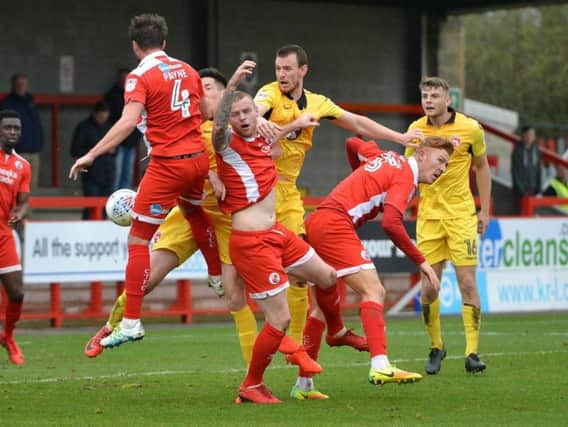 Action from Crawley Town v Morecambe. Picture by Peter Cripps
