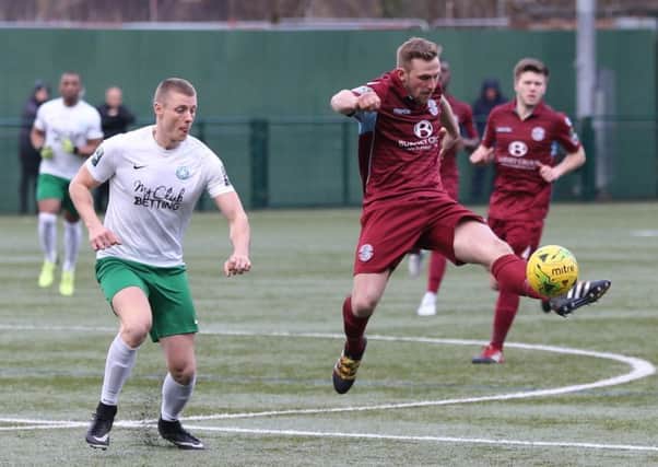 Sam Adams brings the ball under control during Hastings United's 1-0 defeat at Whyteleafe. Picture courtesy Scott White
