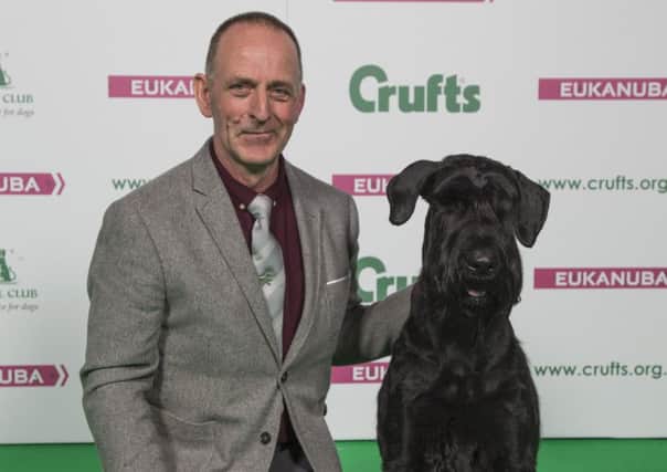 Kevin Cullen with Lana  who won the Best of Breed award at Crufts 2018 SUS-180314-101714001