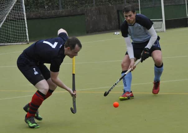Nick Taylor stands in the way of a Kings & Alleyns opponent. Pictures by Simon Newstead