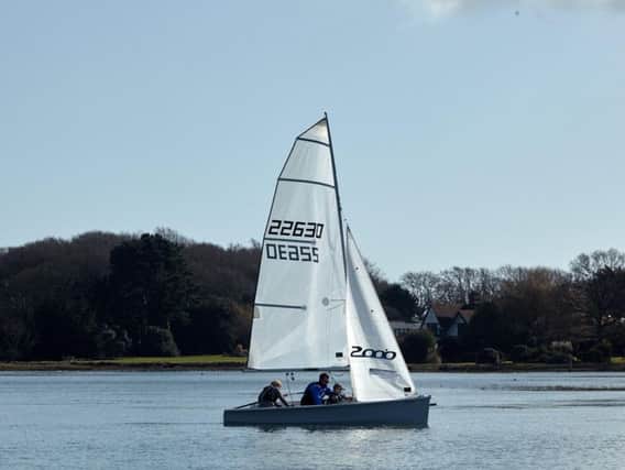 One of the 2000 dinghies that Itchenor Sailing Club wants your help to name