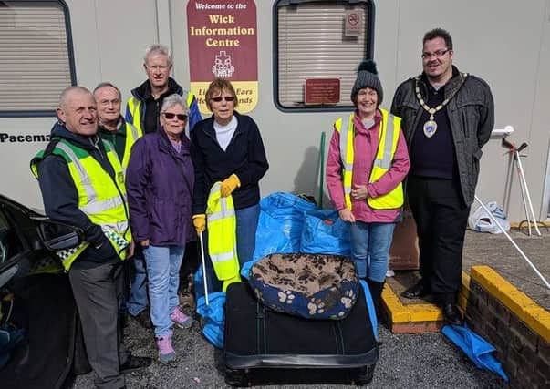 Billy and other volunteers taking part in the Wick Spring Clean